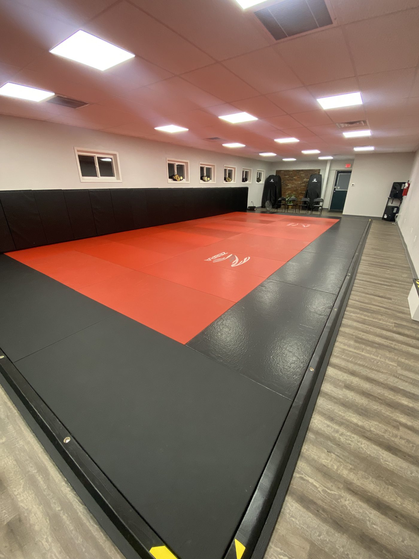 The full competition mat inside the Northstar Jiu Jitsu training room in Eau Claire